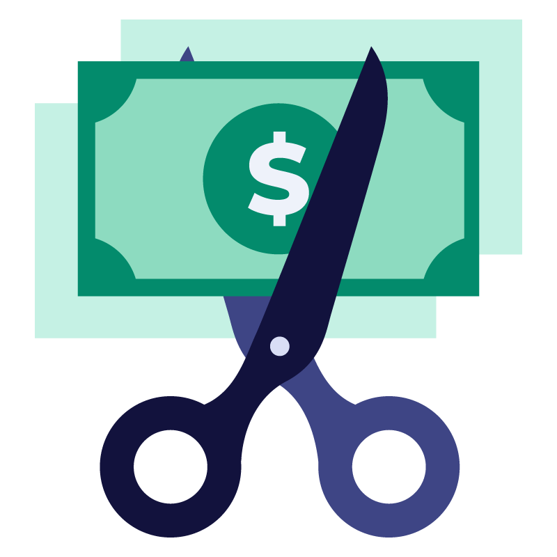 Scissors cutting through a dollar bill