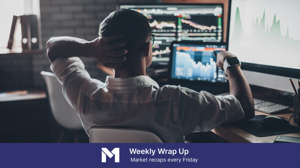 Man looking at computer screen with stock market data a banner overlay that reads "Weekly Wrap Up: market recaps every Friday"