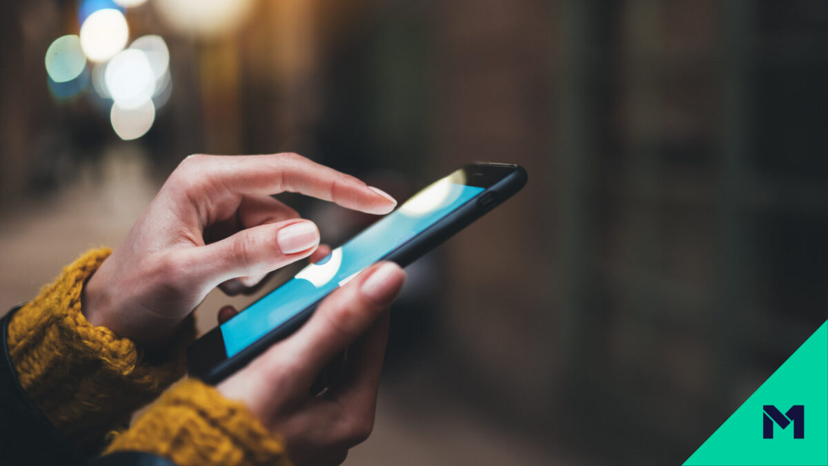 Close-up of woman's hands holding a smartphone