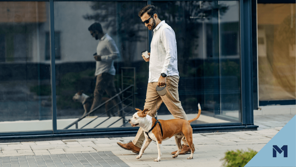 Man walking dog with coffee